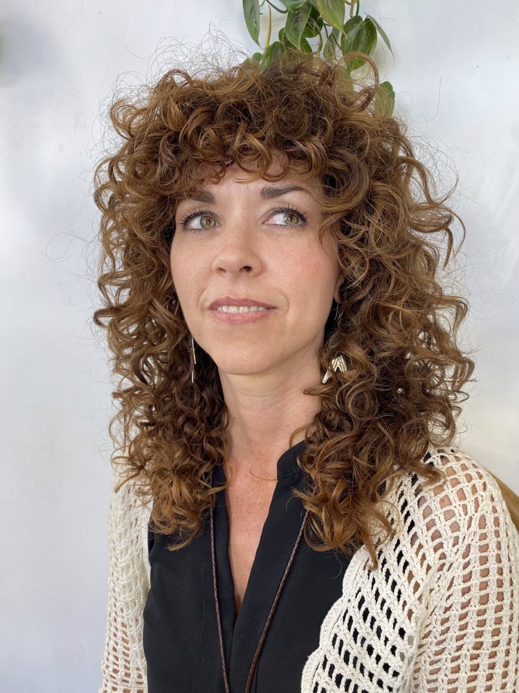 Curly shag cut with soft, airy layers